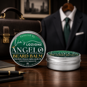 Men's Beard Balm, Scent is ANGELO, 2 oz Twist Top Tin. ANGELO: Warm amber and cardamom spice add depth and sensuality, leaving behind a smooth, masculine scent. Powered By Lia's Lozione.