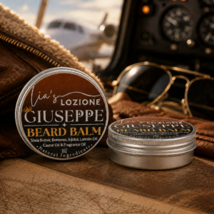 Men's Beard Balm, Scent is GIUSEPPE, 2 oz Twist Top Tin. GIUSEPPE is rich cedar and earthy vetiver complete the scent with a strong, refined finish that feels modern, sophisticated, and undeniably magnetic. Powered By Lia's Lozione.