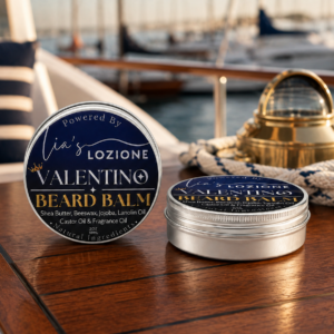 Men's Beard Balm, Scent is VALENTINO, 2 oz Twist Top Tin. VALENTINO is a confident blend of fresh citrus and warm spice with a smooth masculine finish. Powered By Lia's Lozione.