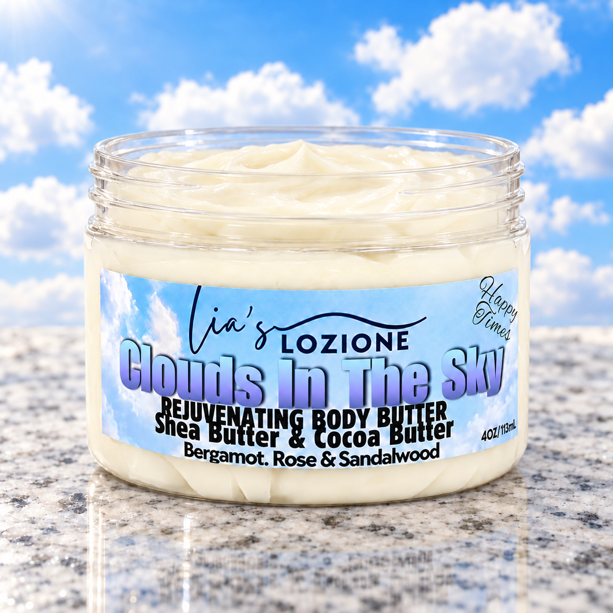 Jar with lid off of Clouds In The Sky Whipped Body Butter, size 4 OZ, by Lia's Lozione. The Scent is Fresh fruity citrus sweet pineapple, creamy coconut warm vanilla and cashmere that wind down with a base of woods.