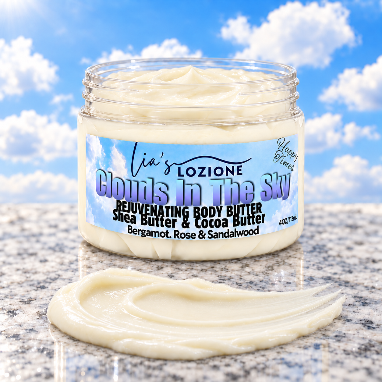 Jar with lid off and Whipped Body Butter Smear of Clouds In The Sky Whipped Body Butter, size 4 OZ, by Lia's Lozione. The Scent is Fresh fruity citrus sweet pineapple, creamy coconut warm vanilla and cashmere that wind down with a base of woods.