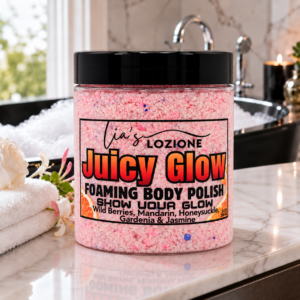 uicy Glow 10 OZ JAR of Body polish in front of tub with bubbles