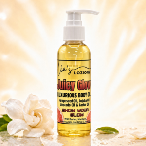 Juicy Glow 4 OZ Body Oil Bottle in a bright cheery setting
